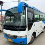 少林牌 19 座客车，符合国五标准，为非营运车辆